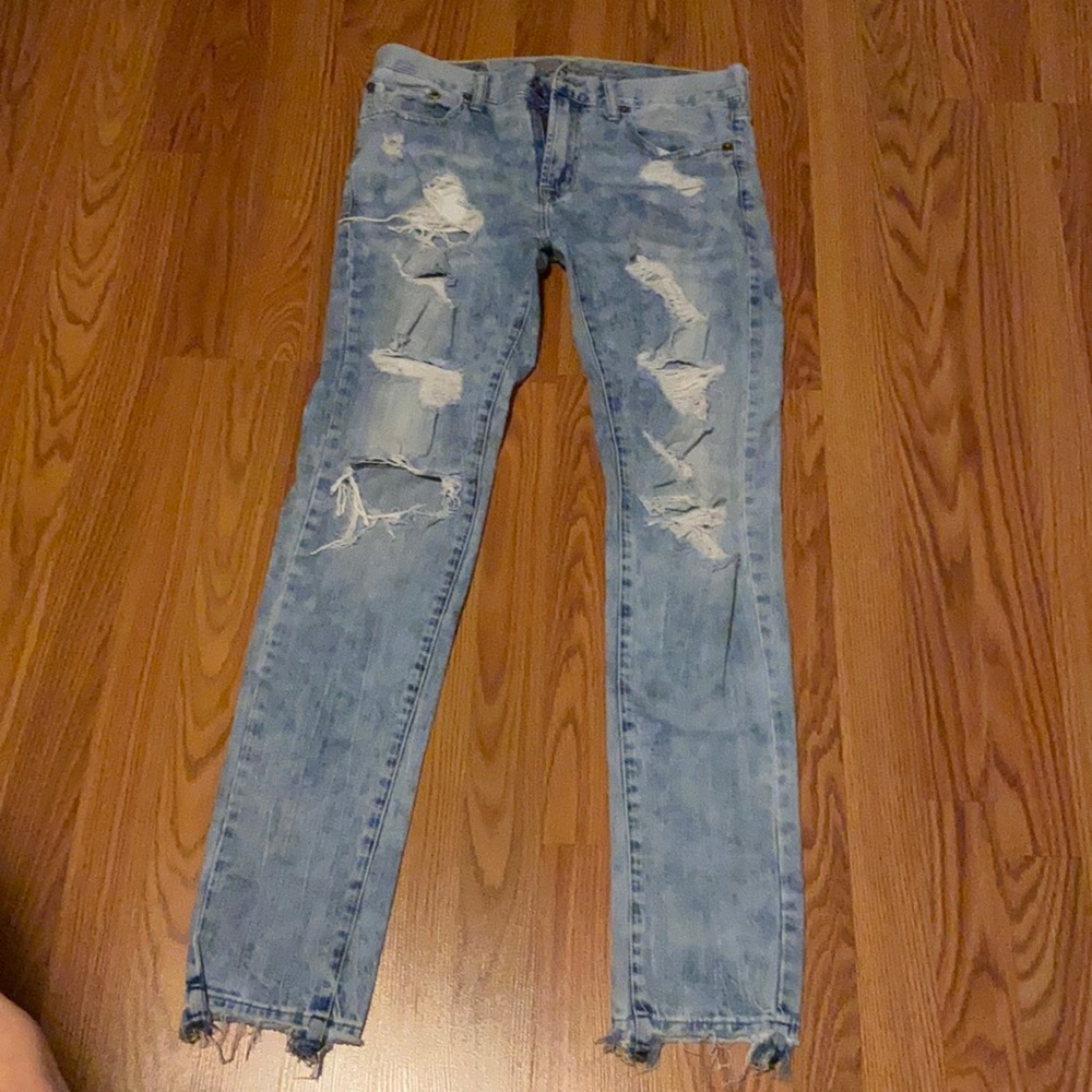 Skinny light washed ripped jeans